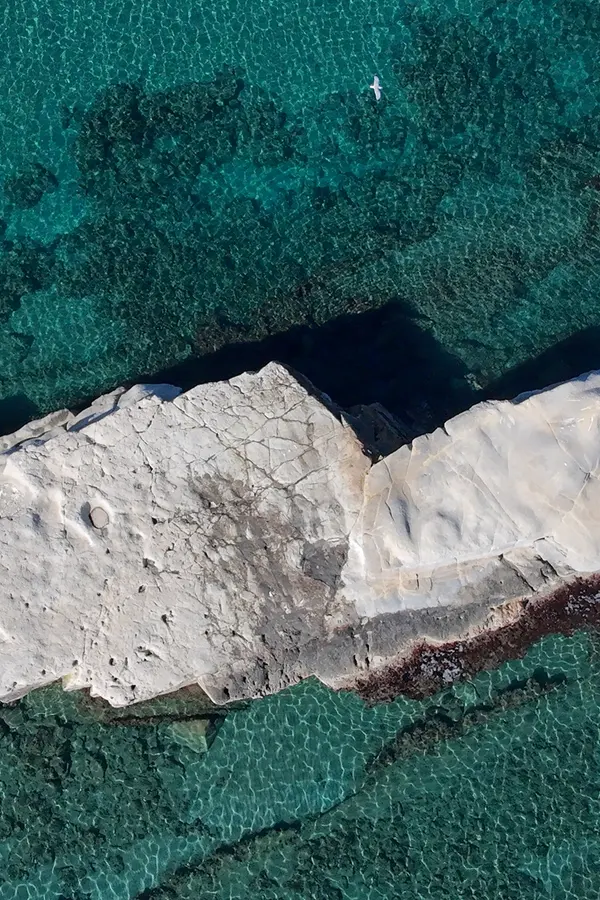 Golden sand and crystal clear turquoise waters defining Kera beach on the Cretan coast.
